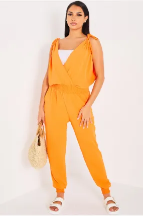 Combinaison pantalon orange fluide à manches noué