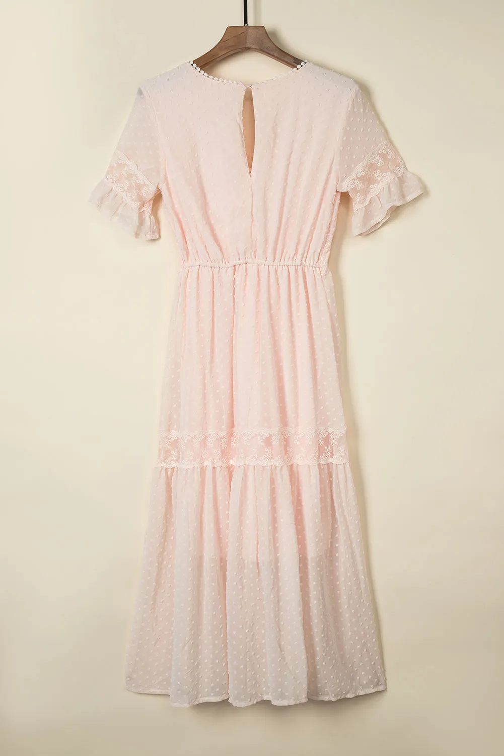 Robe longue en dentelle à pois suisses